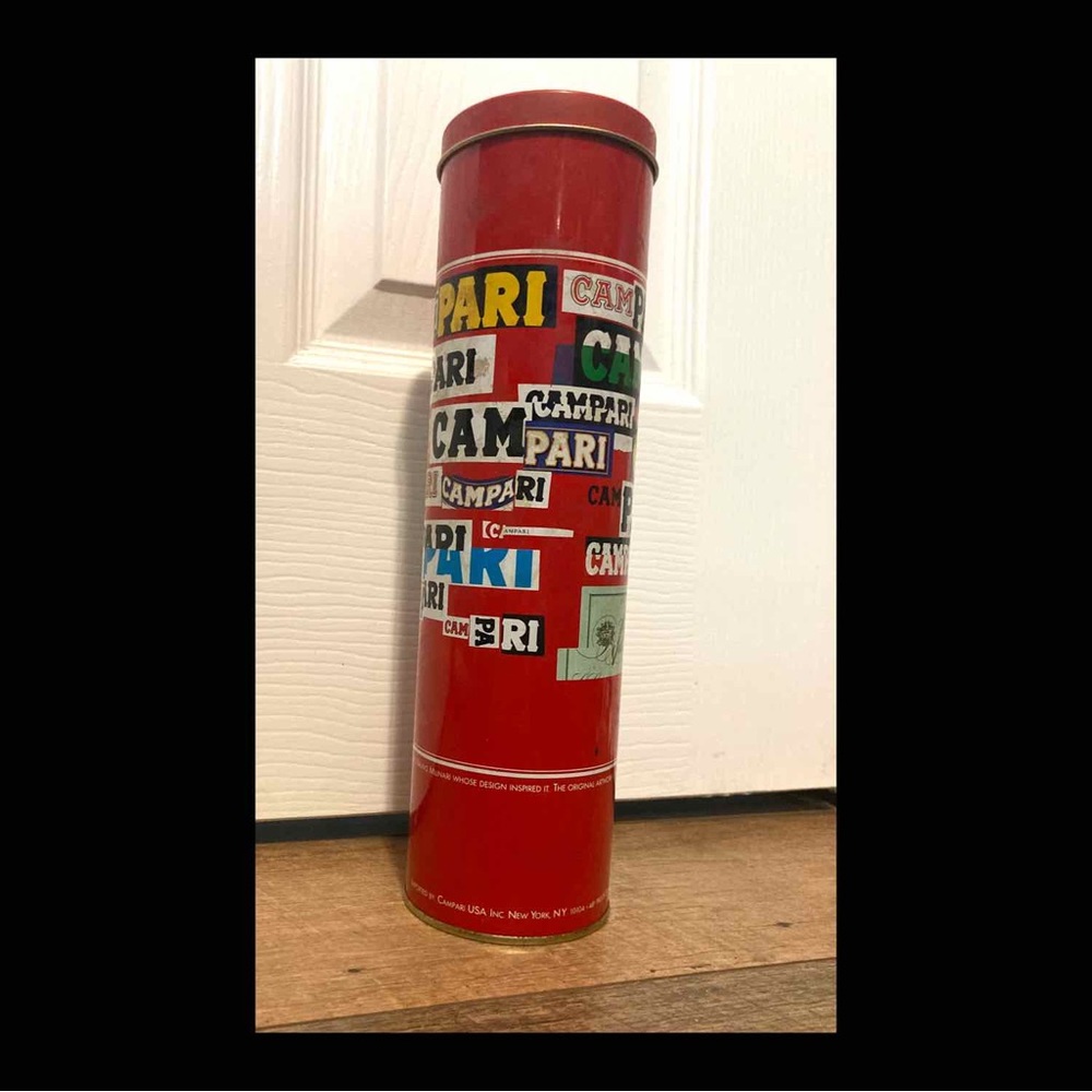 Vintage Campari tin, Bruno Murani artwork.
storage tin, bar decor, Moma New York